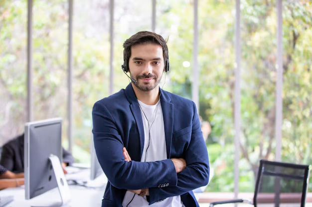 businessman-talking-telephone-with-headset-office_35752-594